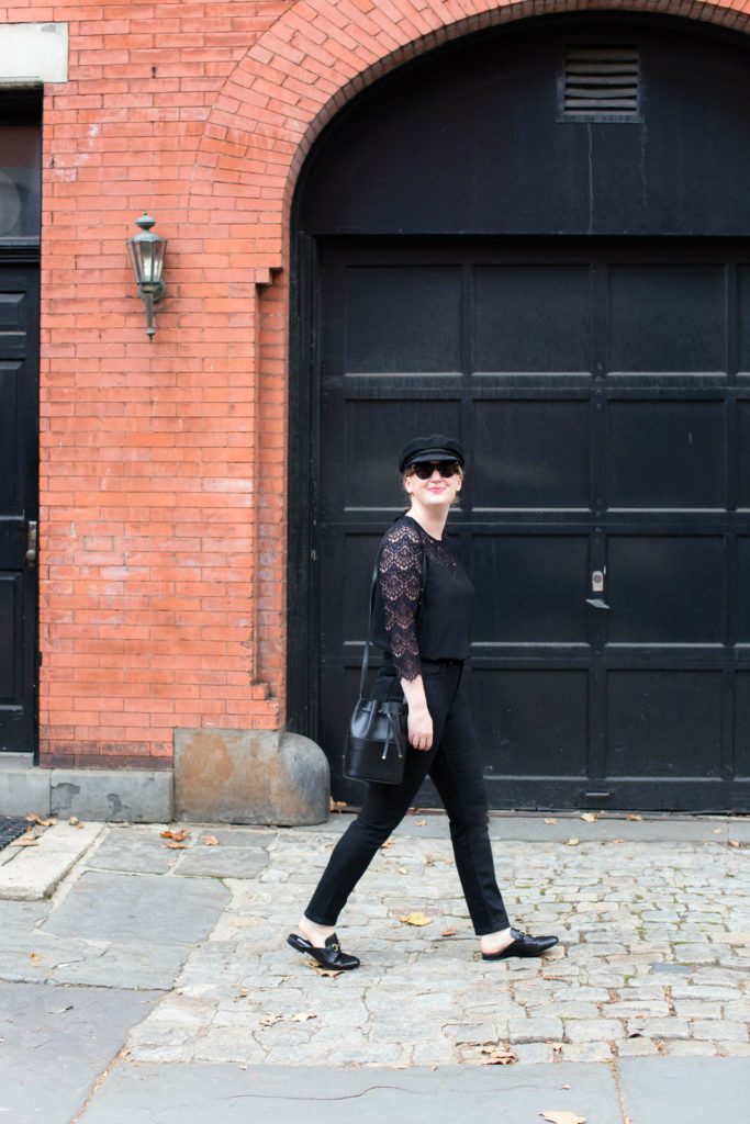An All Black Look styled with a newsboy cap
