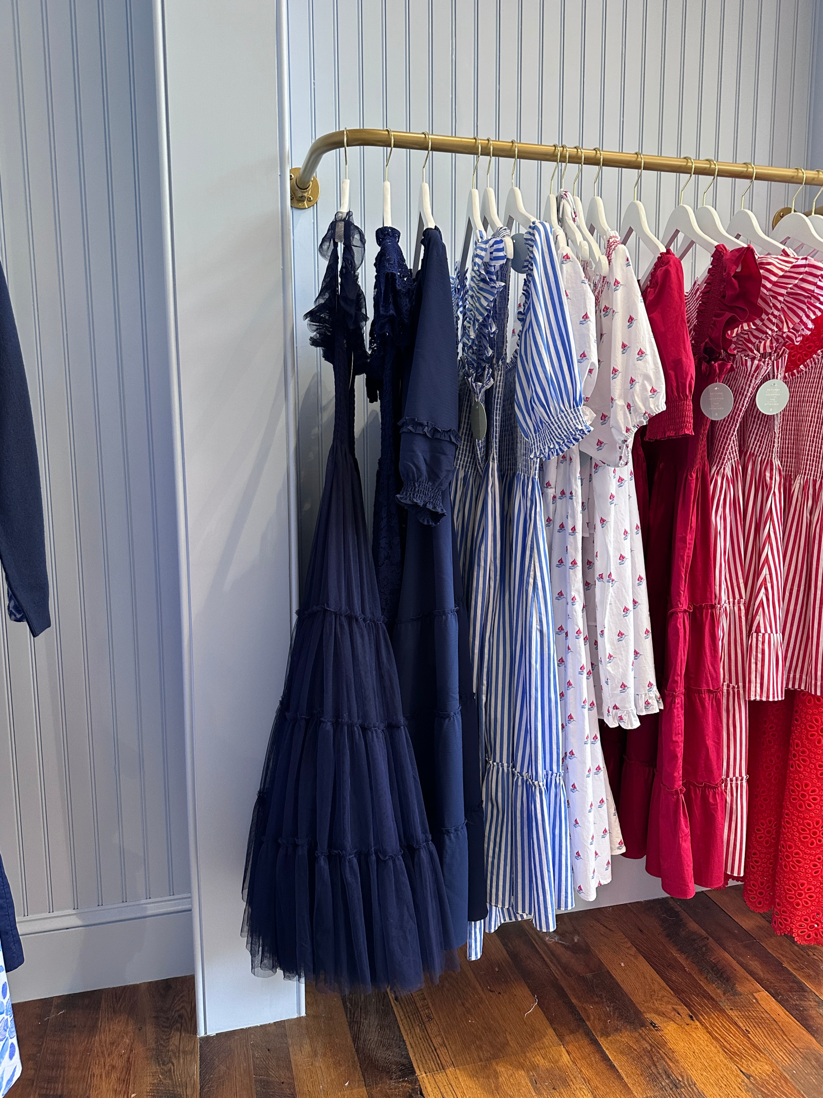 Wit Whimsy shares a photo of a rack of dress in a store