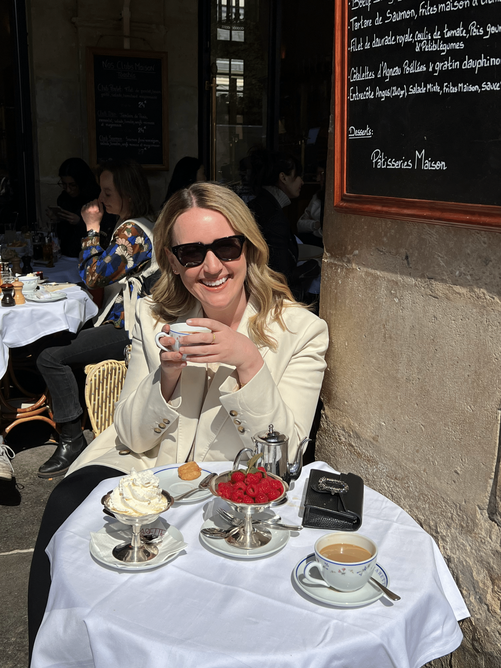 What to Pack for a Girls' Trip to Paris Paris Cafe with Celine sunglasses