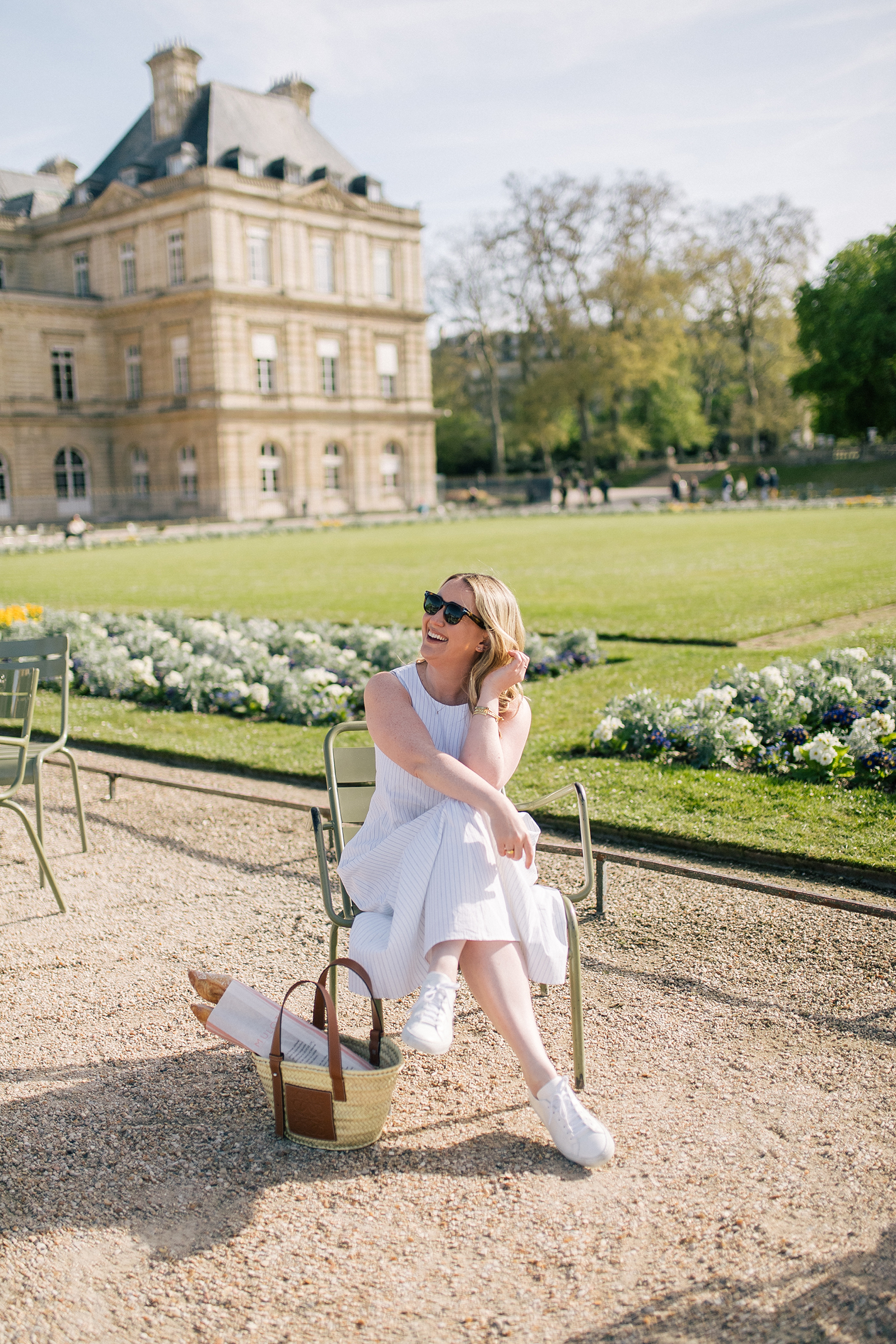 wit & whimsy wearing a white dress with white sneakers