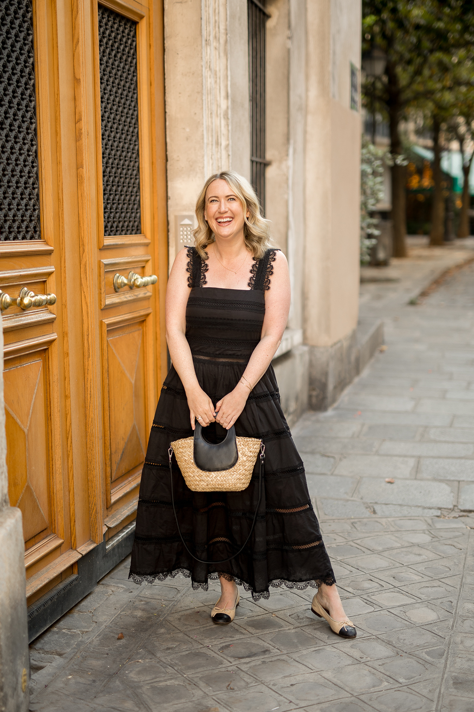 Meghan Donovan in black lace dress in France