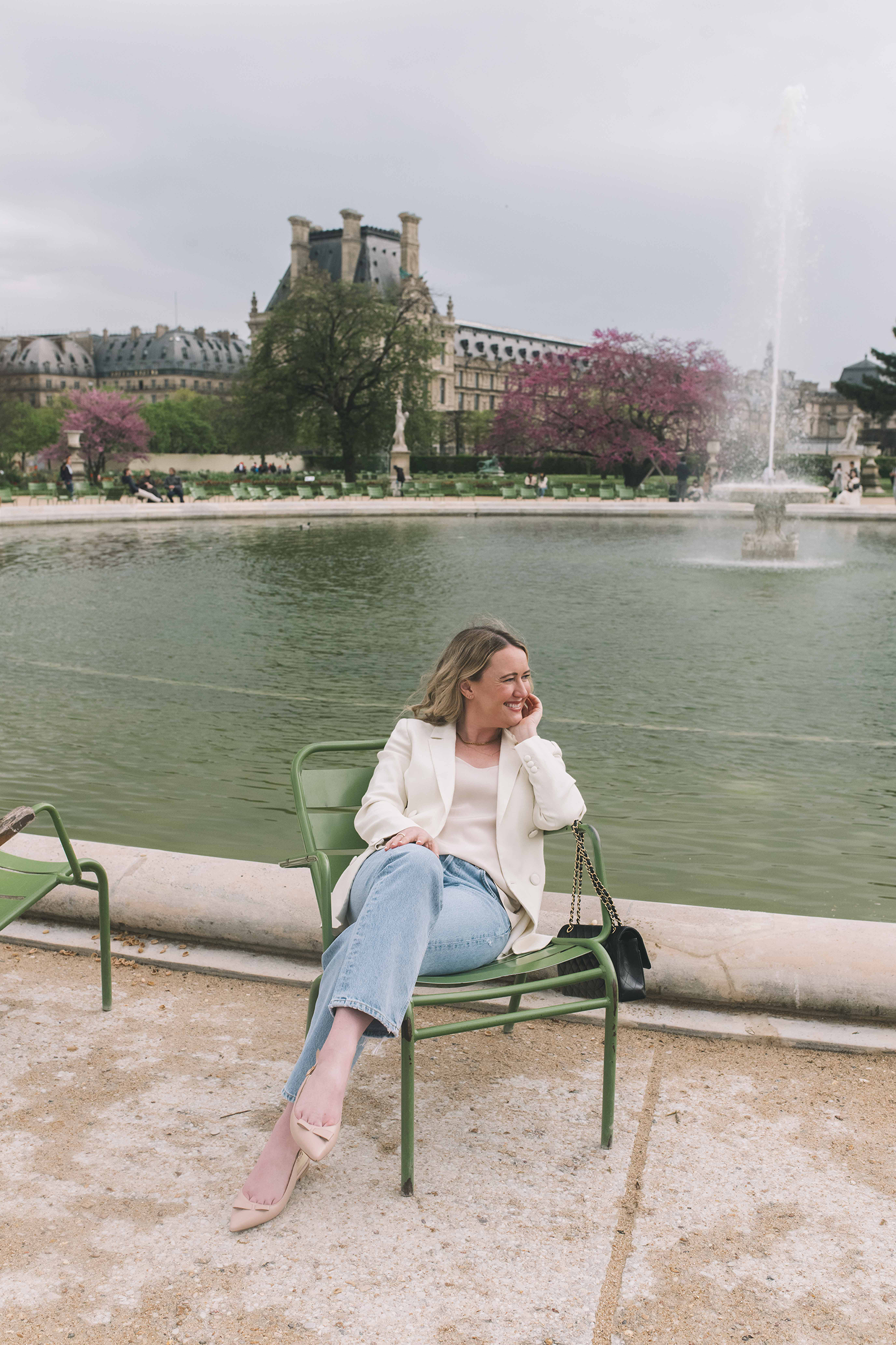 How to Dress for Paris in the Summer Summer in Paris Outfit I White blazer, silk tank, jeans