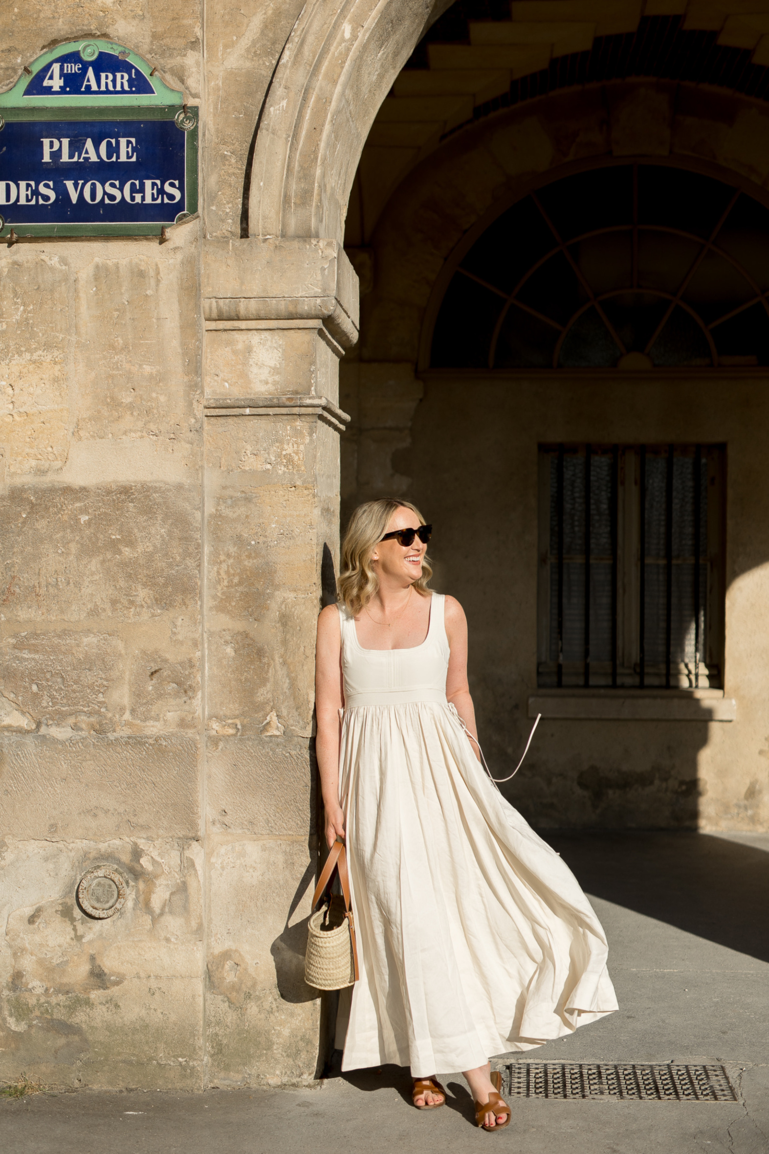 Wit Whimsy shares What to Pack for Europe in Summer - Meghan wearing linen dress