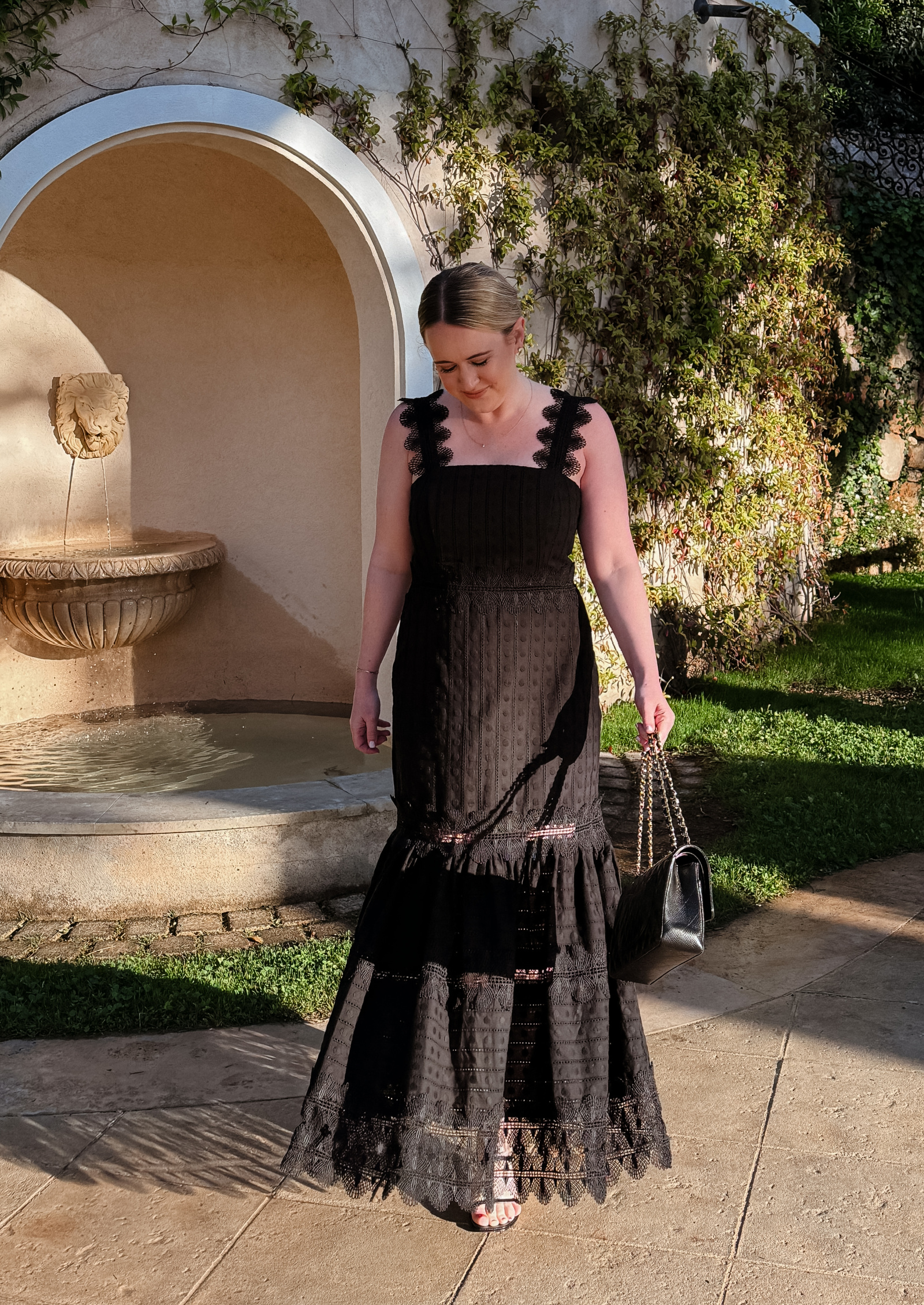 Wit Whimsy Blogger Meghan Donovan shares things I bought and loved 2024 - woman wearing the Waimari Lace Maxi Dress