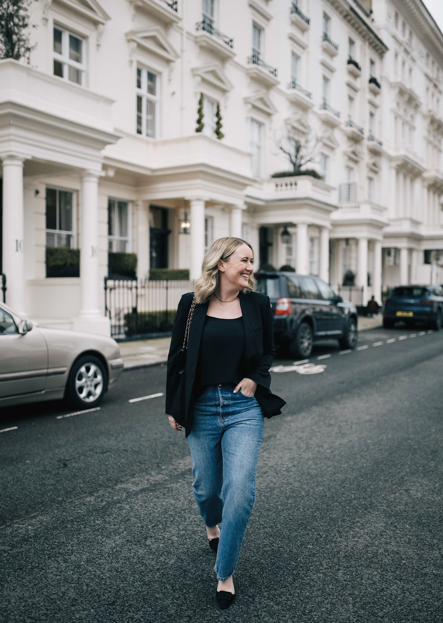 Fall Outfit Ideas with Jeans Wearing fall outfit ideas with jeans: silk blouse, blazer, and high-rise straight leg Reformation jeans.