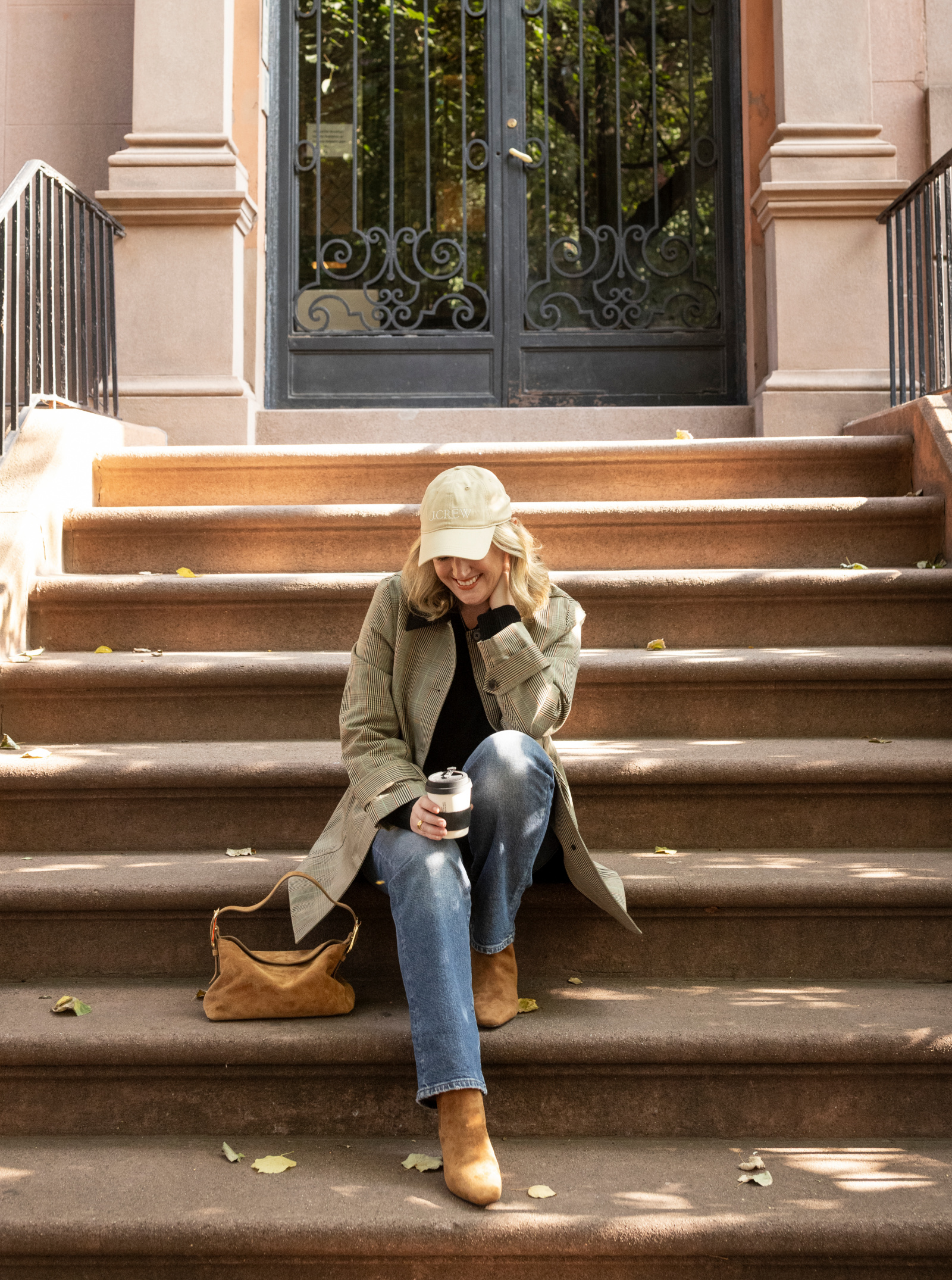 Fall Outfit Ideas with Jeans Wit Whimsy in Barn Jacket, V-neck sweater, straight leg jeans, shoulder bag, suede boots, and ball cap.