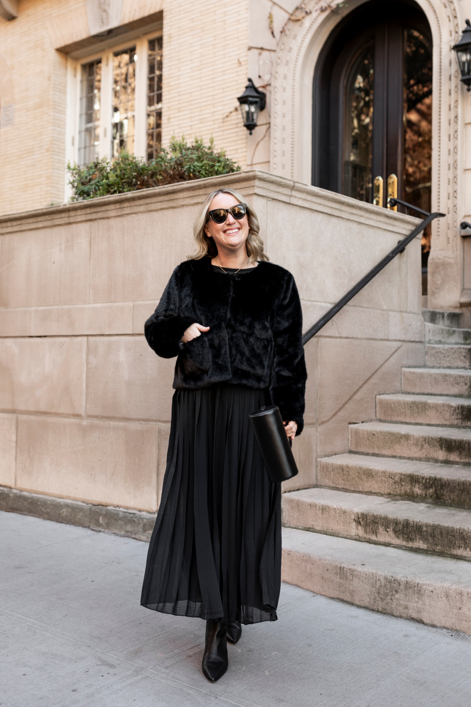 Winter Coats for Women Wit Whimsy Blogger Meghan Donovan shares winter coats for women - woman wearing black coat and skirt