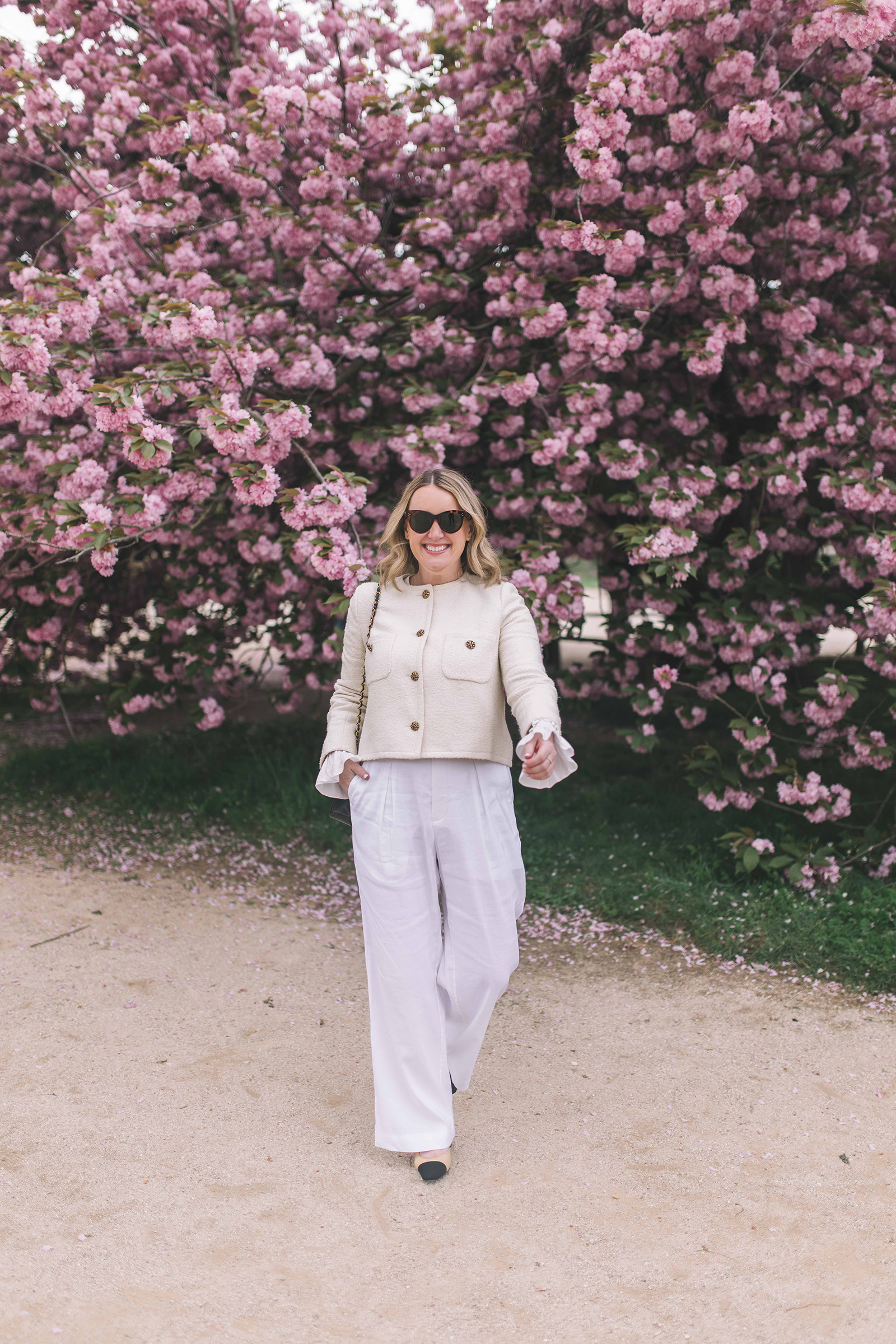 Wit Whimsy Blogger Meghan Donovan wearing white tweed Coat and white pants 