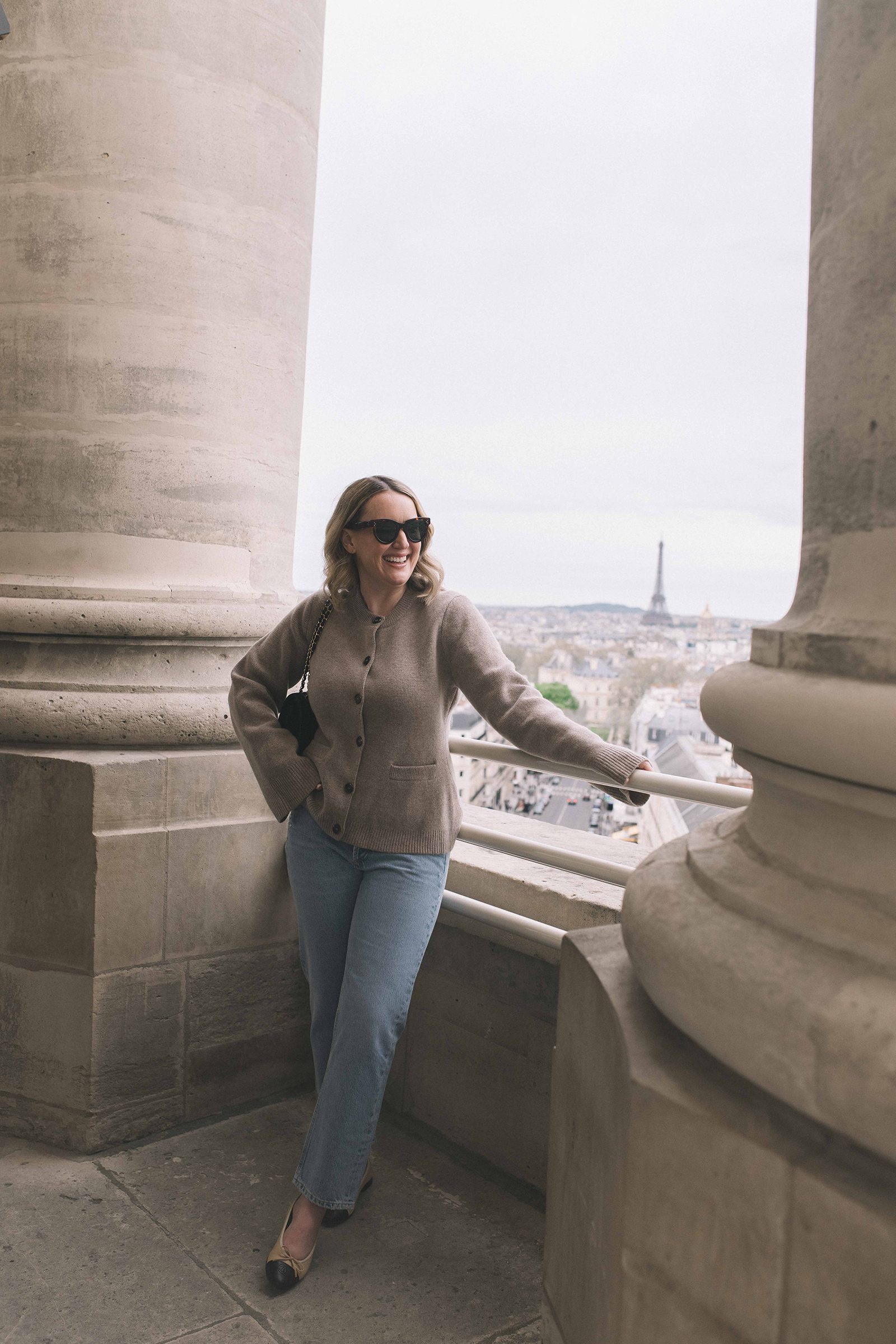 Wit Whimsy Blogger Meghan Donovan shares What to Wear in Paris in the Spring - in photo: Meghan wearing Jenni Kayne cardigan in Paris in spring