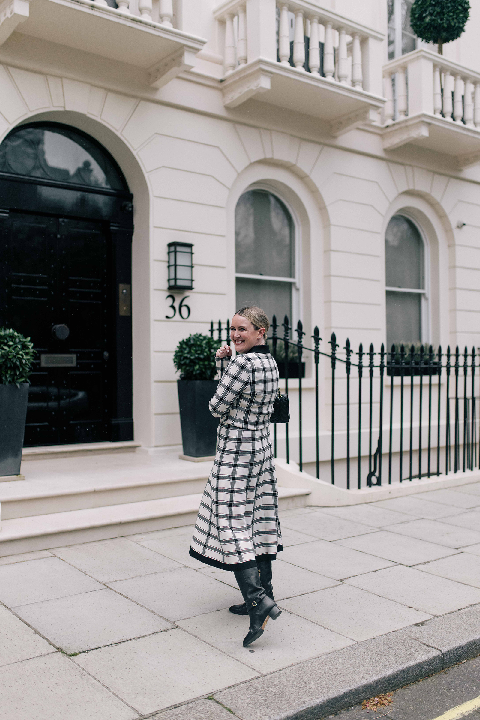 What to Wear in London Knee-high riding boots styled with a monochromatic outfit, London Winter, MMLaFleur matching set