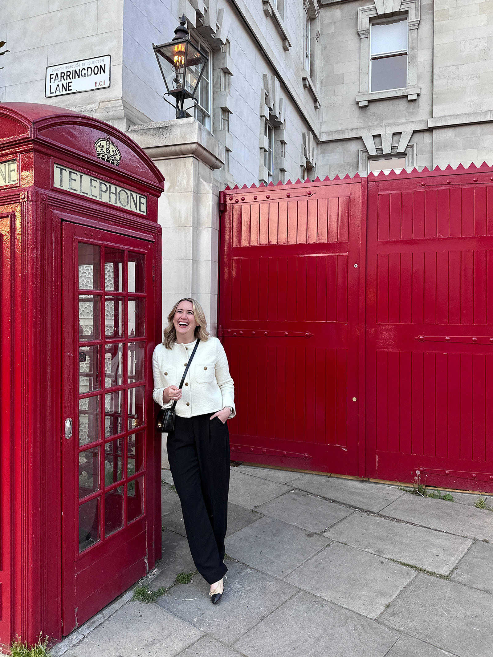 What to Wear in London white cardigan and black bottoms