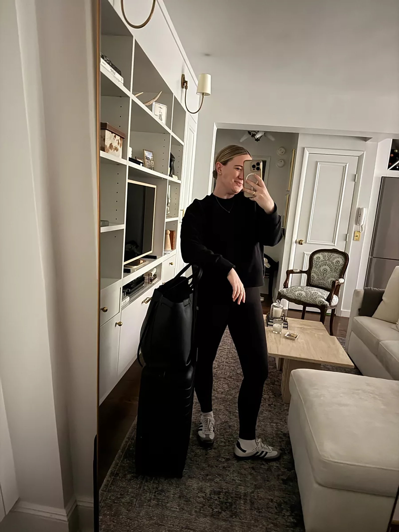 Meghan wearing a Varley sweatshirt and Vuori leggings