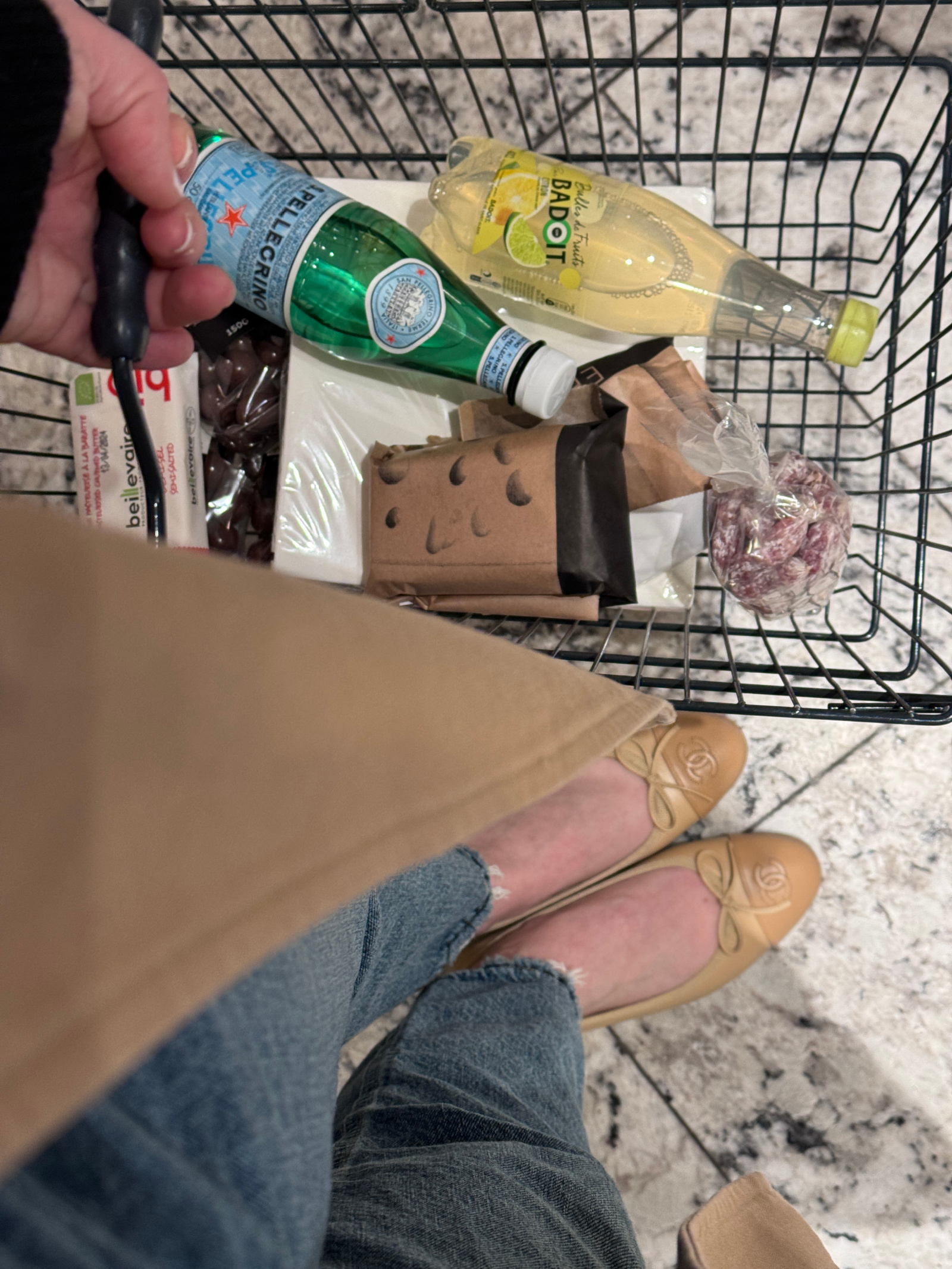 What to Buy at La Grande Épicerie Assorted grocery items in a basket