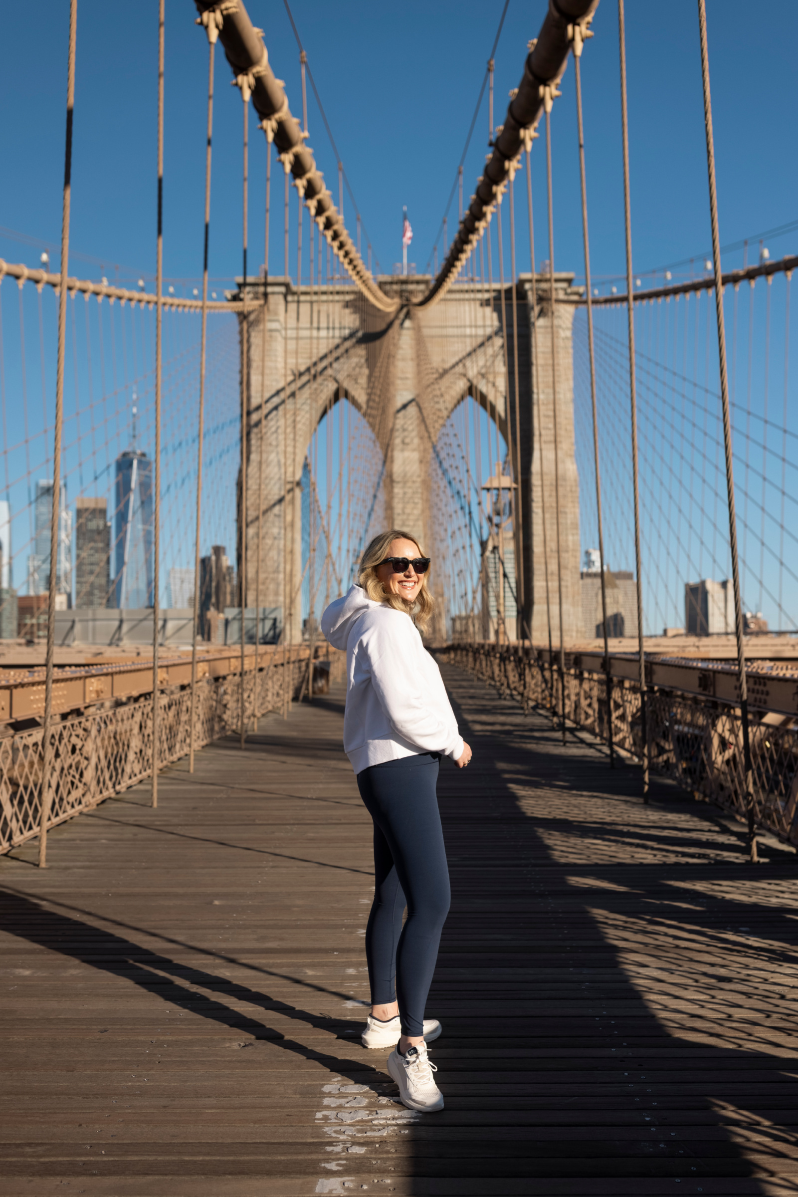 wit & whimsy wearing Vuori Leggings