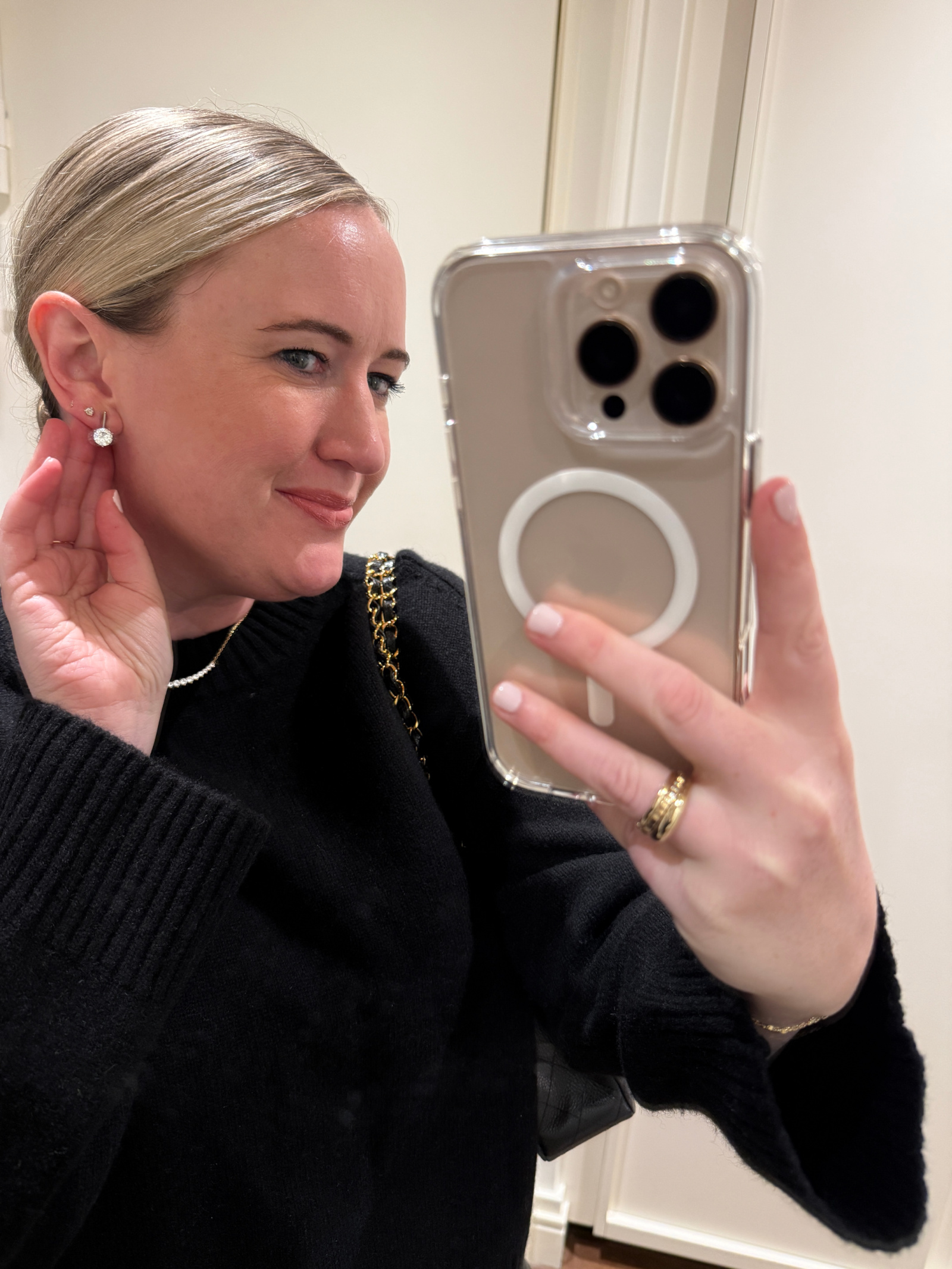  Wit Whimsy Blogger Meghan Donovan shares Dorsey Jewelry Review - woman taking a sefie showing her Dorsey Henry Stud Earrings